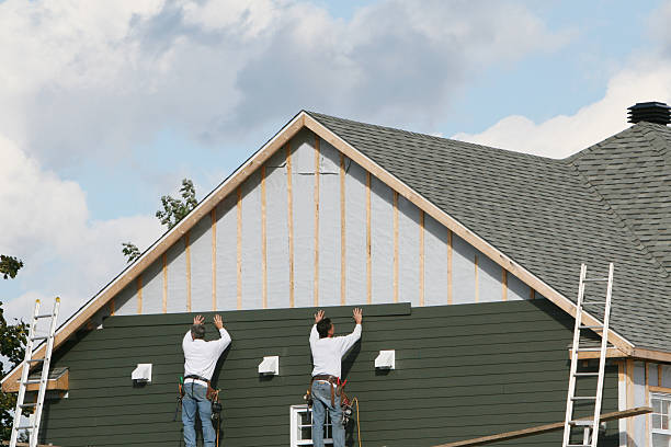 Professional Siding Replacement technician working in Plain City, OH